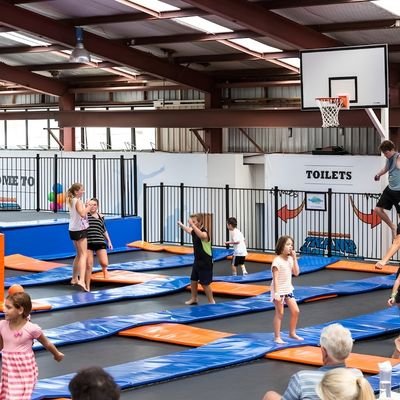 Families and kids enjoying trampoline activities at an entertainment center in Cambridge New Zealand