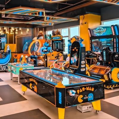 Modern arcade gaming area with interactive machines in Cambridge New Zealand